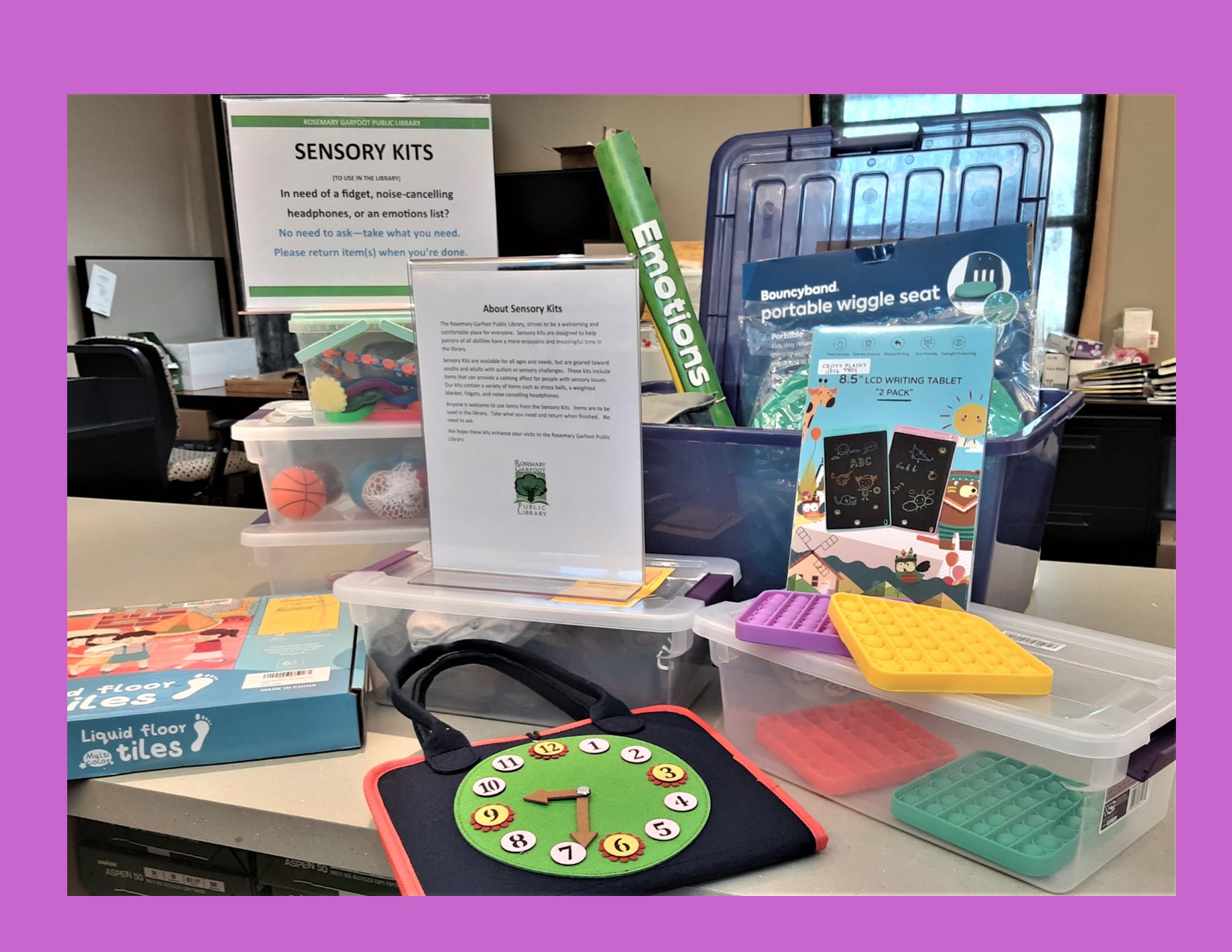 Photo of some Sensory Kit contents.  Includes fidgets, bubble pops, floor tiles and more.  