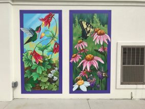 Photo of the Crossroads Coffee nature murals hanging on the walls