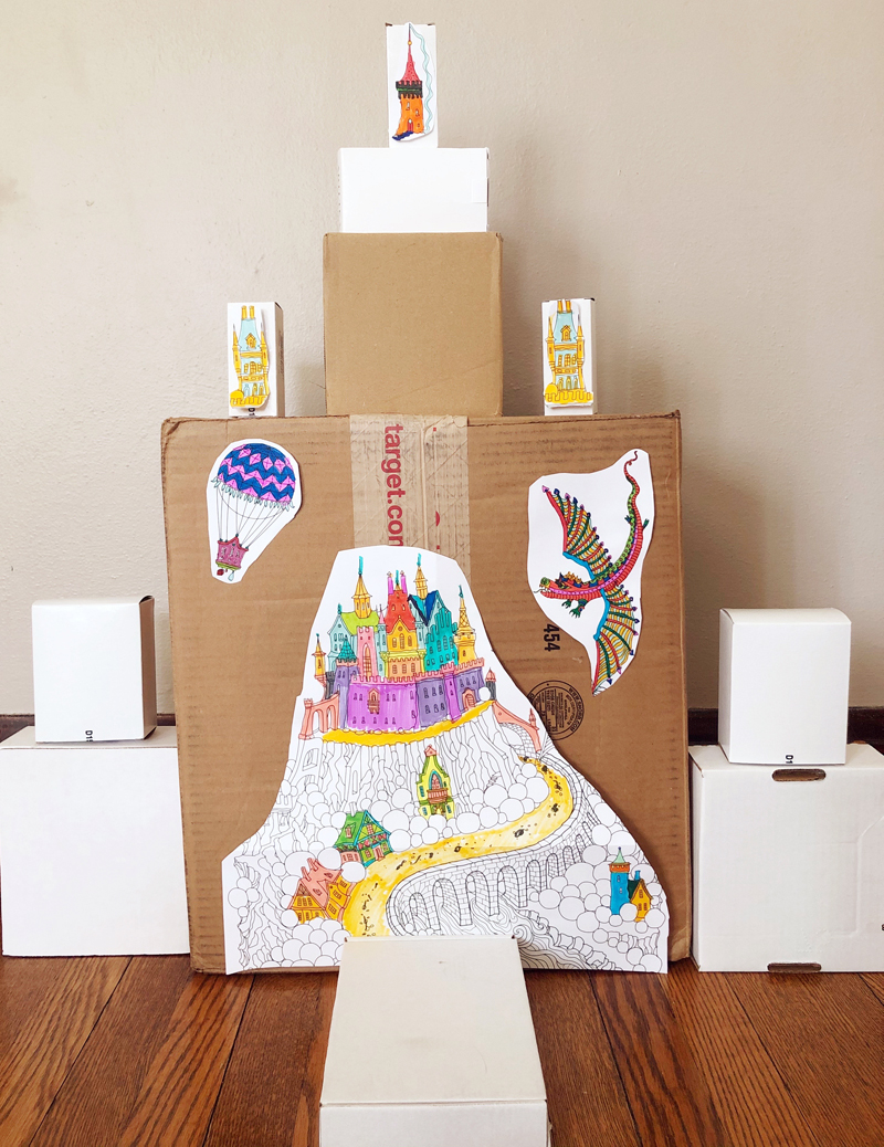 Castle made from cardboard boxes and  hand-colored castle images