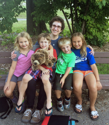 Lunch in the Park Ms. Catherine with 4 kids in the park.