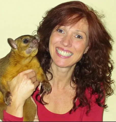 Noelle Bezio of Zoozort Noelle holds furry friend