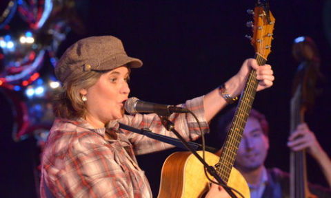 Laura Doherty performs with guitar