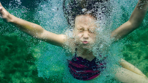 Big Splash Pool Party Child swimming underwater
