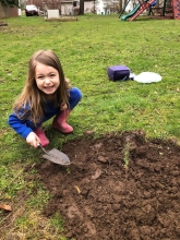 girl planting tree