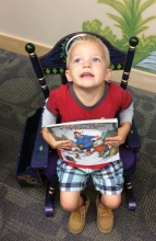 Little boy in rocking chair